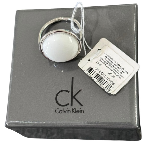 Calvin Klein NWT Loop Two Tone Ring with a Round White Coral Stone Size 9 - Picture 2 of 8